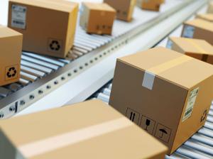 Photo of cardboard boxes on assembly line